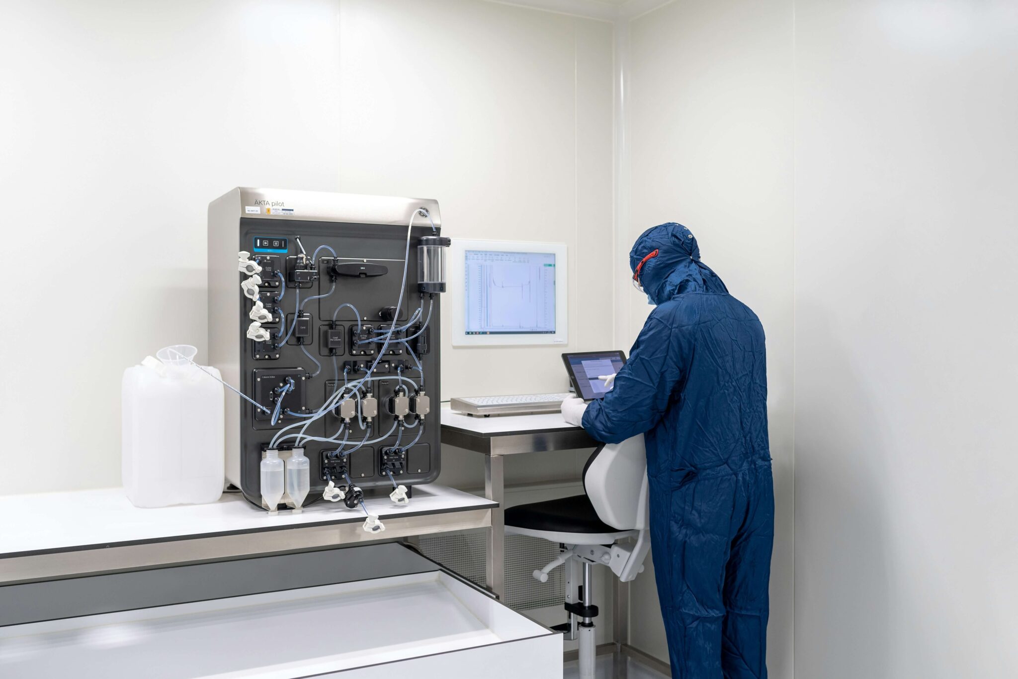 Technician working in a cleanroom